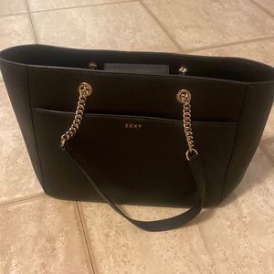 Black DKNY purse with gold chain